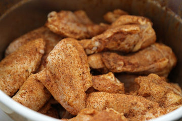 Rub Smoked Wings in a caserole