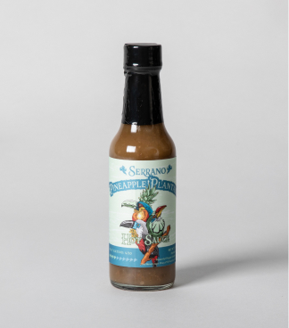 Bottle of Pineapple Serrano hot sauce