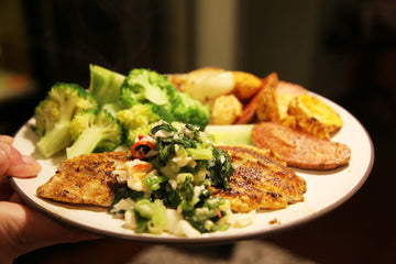 Grilled Fish with Broccoli, Green Onion, Garlic, Crab, and Potatoes